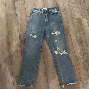 Blue Straight Leg Distressed Jeans with Raw Hem and Fading